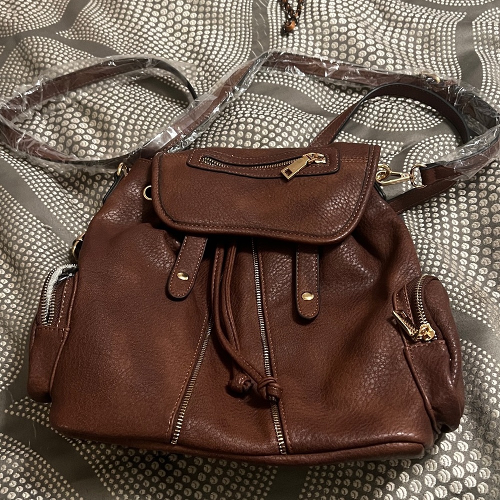Brown Leather Backpack with Gold Accents